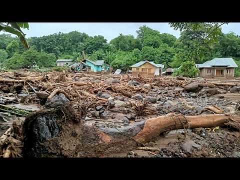 Workers clean up after deadly floods hit East Timor capital
