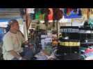 Street vendors in Aceh sell Muslim prayer accessories