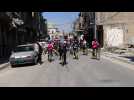 Iraqi female cyclers rally to promote bike-riding in Mosul