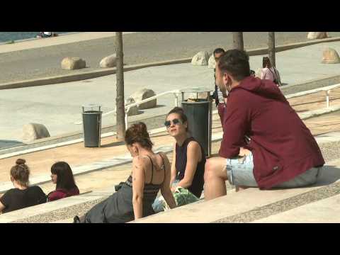 Lyon locals enjoy early summer weather on banks of the Rhône