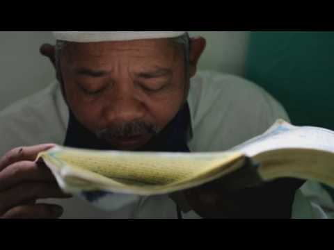 Braille Koran reading for visually impaired Muslims during Ramadan in Indonesia