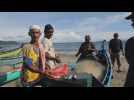 Fishermen continue working in Banda Aceh during Ramadan