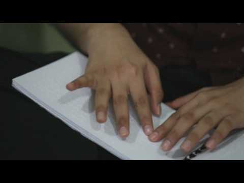 Blind Muslims read the Koran in Braille for Ramadan in Indonesia