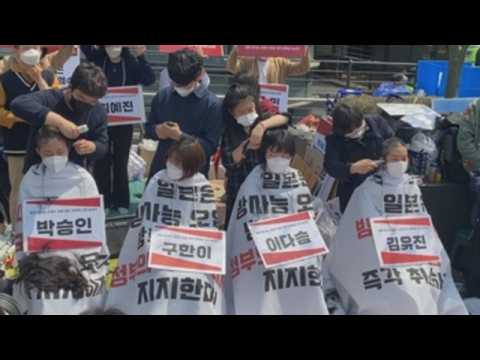 South Korean students shave their heads in protest against Japan's radioactive water discharge