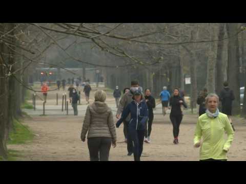 Parisians exercise near Eiffel Tower on second day of new lockdown