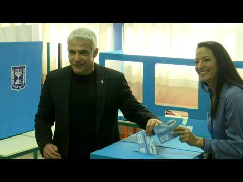 Centrist Yesh Atid party leader Yair Lapid casts his vote
