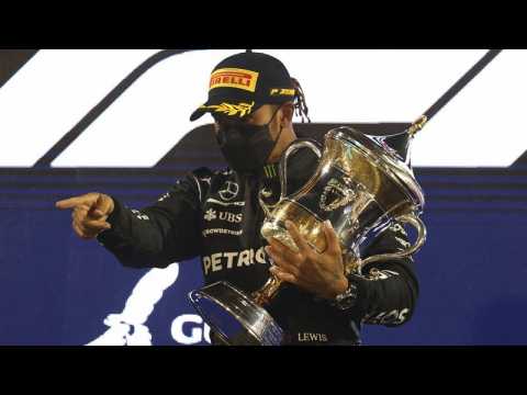 World champion Lewis Hamilton holds off Verstappen to win a tense season-opening Bahrain Grand Prix