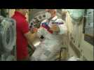 Three-man crew enters ISS after flight honouring Gagarin