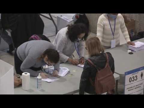 Ecuadorian citizens living in Spain vote in their country's election