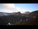 People flock to Iceland's erupting volcano