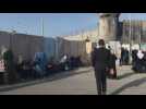 Palestinians cross Kalandia checkpoints to attend prayer during Ramadan