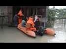 India's rescue teams face double challenge in Assam floods operations