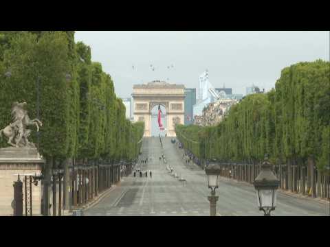 Bastille Day: the Champs-Elysées empty, downsized military parade confined to Place de la Concorde
