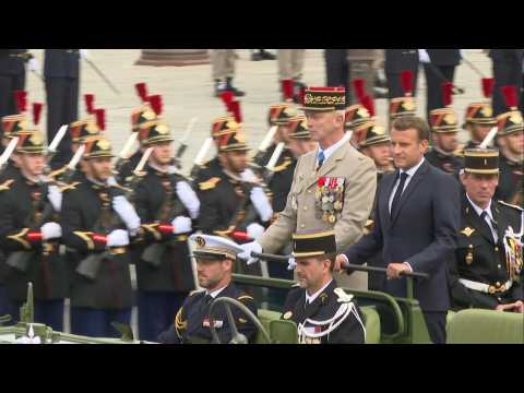 Macron arrives at downsized Bastille Day