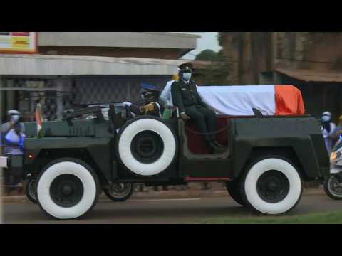 Body of Ivorian Prime minister Gon Coulibaly arrives for burial in his hometown
