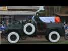 Body of Ivorian Prime minister Gon Coulibaly arrives for burial in his hometown