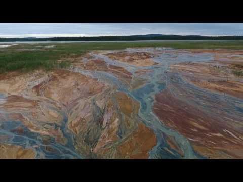 Russia launches probe into 'orange' Urals rivers