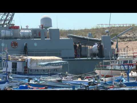 Images of Italian coast guard boat in Lampedusa harbour after migrants rescued