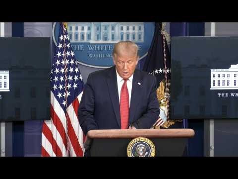 Trump escorted from news conference during security lockdown at the White House