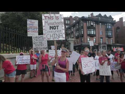 Hundreds protest against flu vaccine mandate for students in Boston