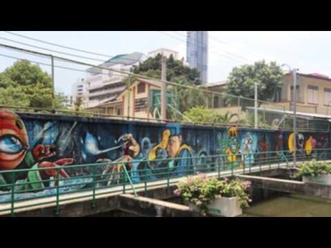 Bangkok's canals come alive with colorful murals