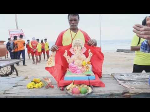 Hindus celebrate last day of festival for god Ganesha with water rituals