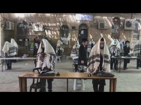 Israel celebrates Sukkot in lockdown
