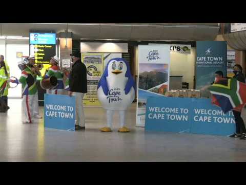 Party atmosphere in Cape Town airport for first international arrival in months