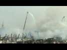 Smoke billows as Lebanese firefighters quell Beirut port fire