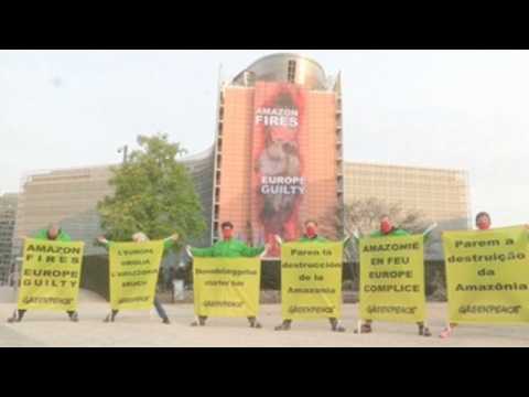 Greenpeace puts up banner against Amazon deforestation at EC headquarters
