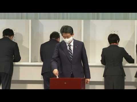 Japan ruling party casts vote to determine successor to PM Abe