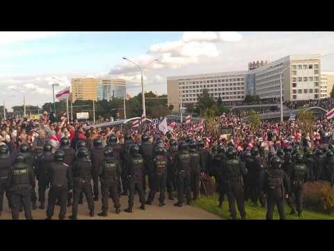 Belarus: thousands of protesters face riot police in capital Minsk