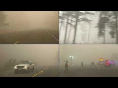 Thick smoke from wildfires shrouds highway in Oregon