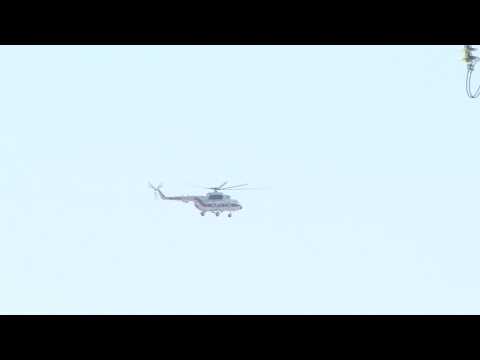 Belarus: protests as President Lukashenko's helicopter arrives at Minsk factory