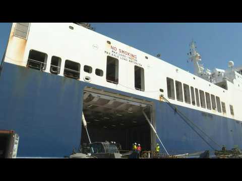 Soldiers unload aid from French ro-ro cargo ship at Beirut airport