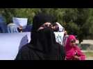 Afghan women rally to demand preservation of rights as peace talks begin