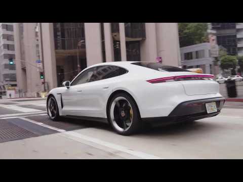 The new Porsche Taycan 4S in Carrara White Driving Video
