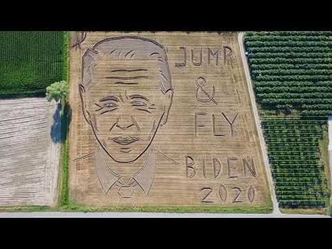 An artist in Italy has carved a huge portrait of Joe Biden into this field