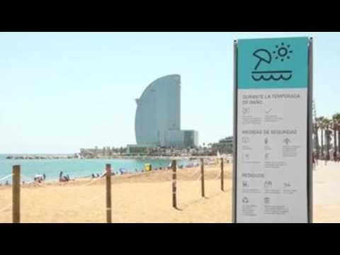 Barcelona reduces capacity at beaches after new coronavirus outbreaks