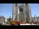 Fire fighters tend to Nantes Cathedral after fire causes damage