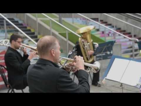 Musicians of the London Philharmonic Orchestra perform at Wembley Park