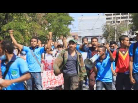 Dozens of protesters gather to protest against criminal defamation law in East Timor