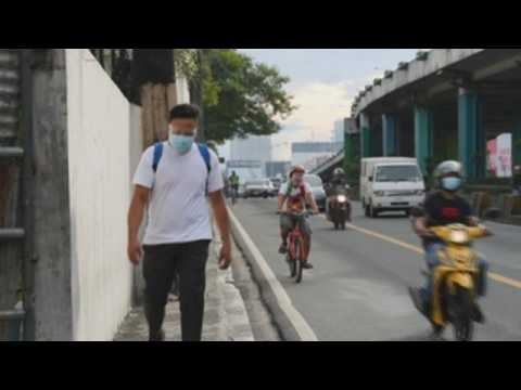 Manila, adjoining provinces return to stricter lockdown amid virus surge