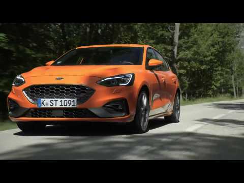 The new Ford Focus ST in Orange Fury Driving Video