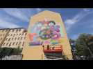 Visual artist Eme Freethinker paints mural in Berlin to mark 75th anniversary of Hiroshima and Nagasaki