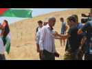 Palestinians protest against the appropriation of their land by Israeli settlers