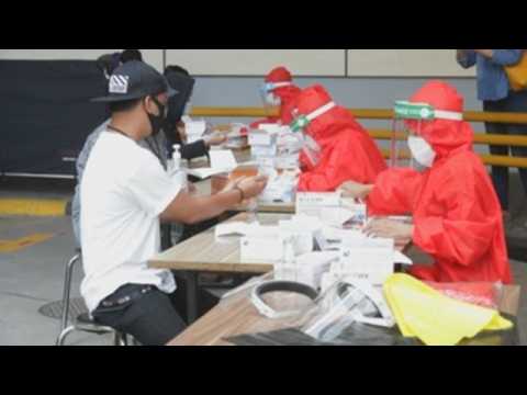 Shopping mall employees undergo COVID-19 test in Indonesia