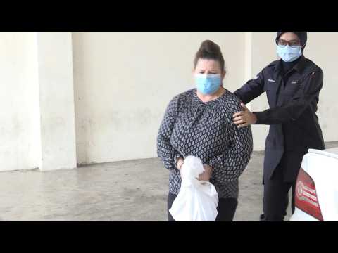 Malaysia: British woman accused of murdering husband arrives at court