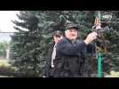 Belarus: video shows Lukashenko holding an automatic rifle, wearing body armour