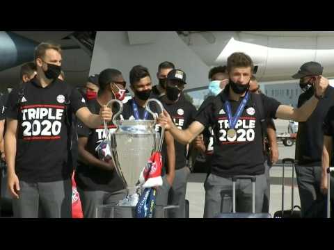 Football/Champions League: Bayern's victorious players arrive in Munich